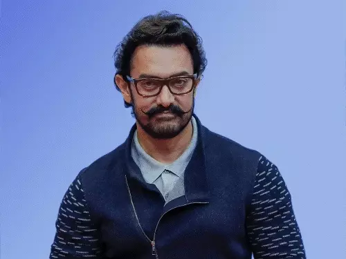 मुंबई के पाली हिल स्थित अभिनेता आमिर खान के आवास के बाहर तैनात सुरक्षा कर्मियों का सांकेतिक दृश्य।