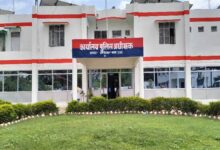 जमीन के दस्तावेज और पुलिस जांच से जुड़ी सांकेतिक तस्वीर।